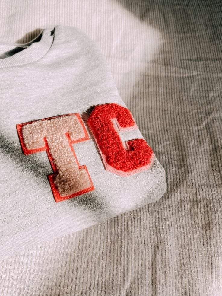 Textured applique apparel detail